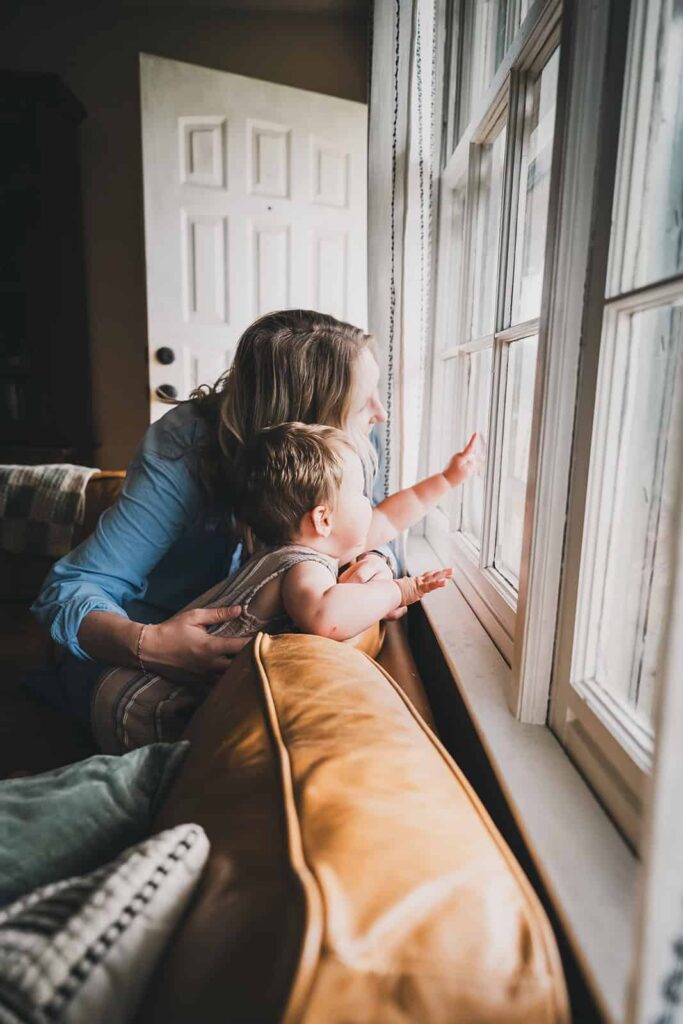 Family enjoying a relaxed at-home photography session in Nashville, TN