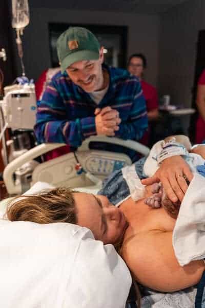 Birth photography session in a Murfreesboro hospital, capturing parents with their newborn