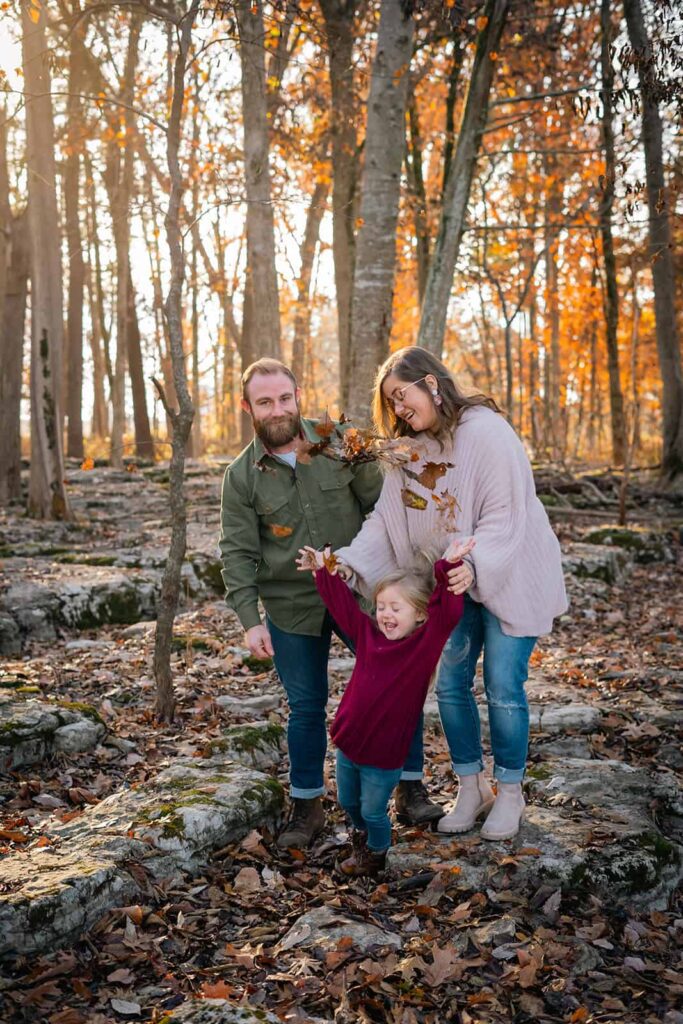 Family enjoying an outdoor fall photography session in Nashville, Tennessee