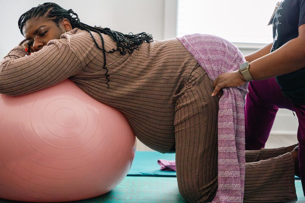 Labor and delivery photography session in Murfreesboro documenting a mother during childbirth