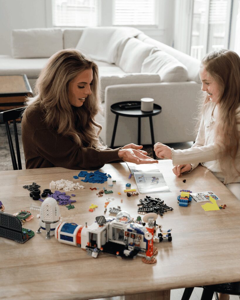 Mother and daughter sharing a joyful moment during a family photography session in Middle Tennessee