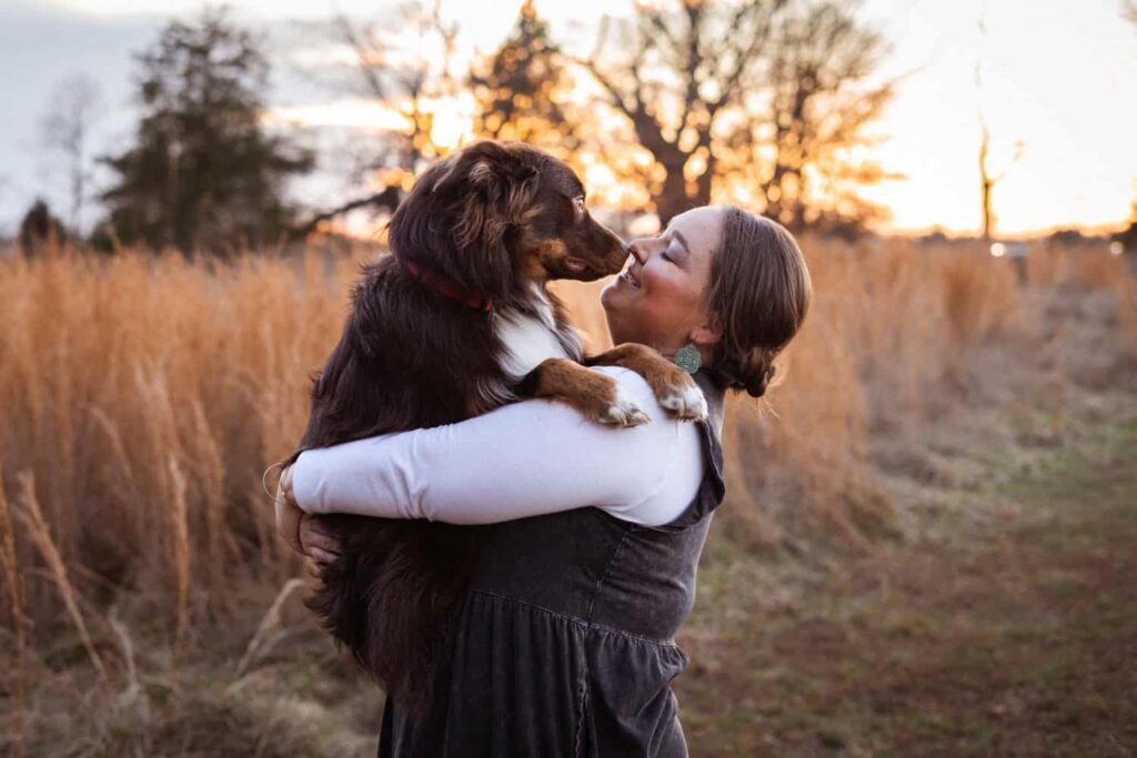 Family with their pet during an outdoor photography session in Murfreesboro, TN